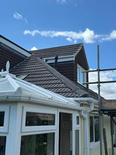 Tiled roof with new white roofline